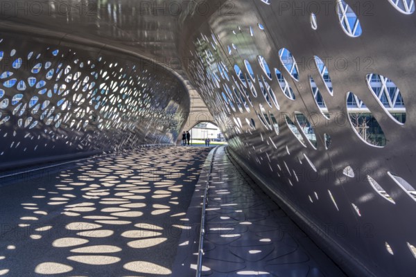Light effects from the sun in the Parkbruk, a cycle and pedestrian bridge in the city centre of