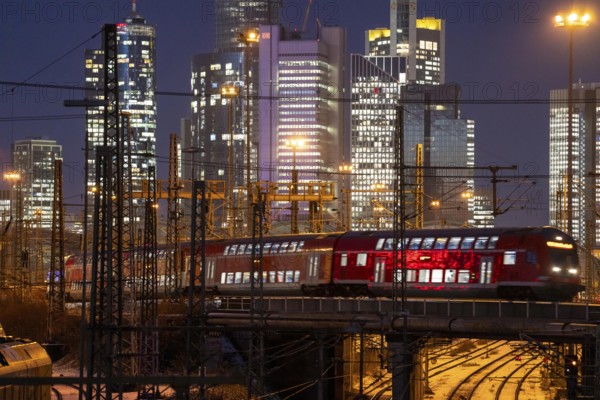 Railway tracks in front of the main railway station in Frankfurt am Main, skyline of skyscrapers in