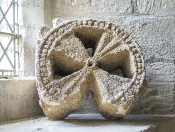 Head of ancient stone cross discovered in churchyard, church of Saint Michael, Yanworth,