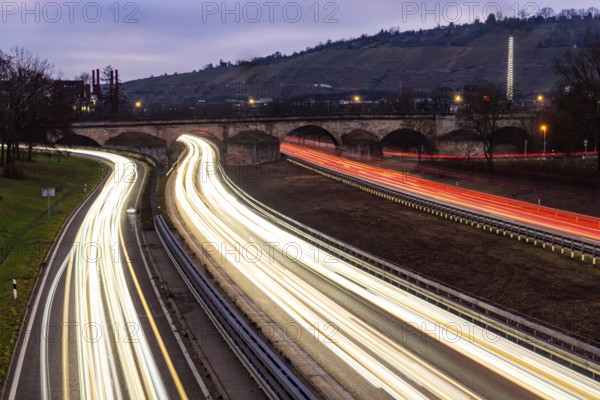 Multi-lane road at night with Plinsau bridge, arch bridge over the Neckar. Federal road B10 in