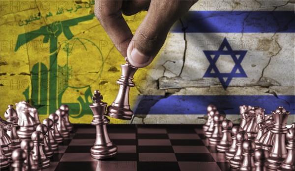 Israel vs Hezbollah flag concept on chessboard. War between Hezbollah and Israel. Conflict between