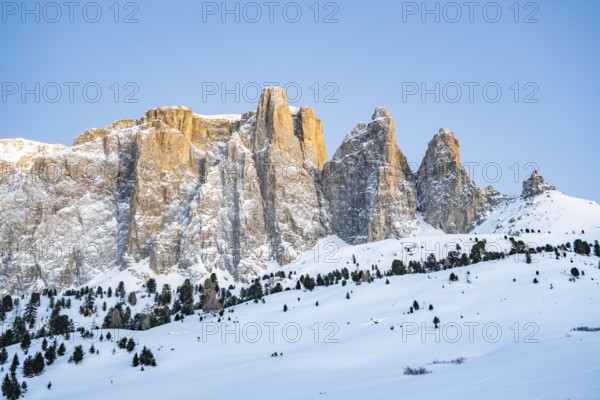 Beautiful landscape of the Mountain silhouettes of the Sexten Dolomites on a sunny winter day,