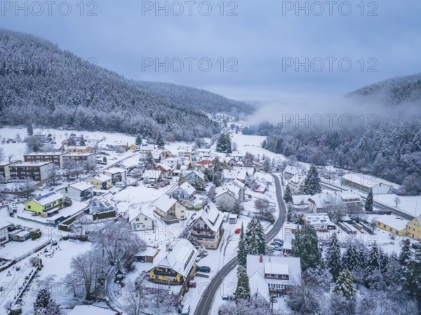 Dreamy village in a wintry and misty forest landscape, Enzklösterle, Calw district, Black Forest,