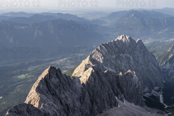 Steep rocky ridge, Waxensteinkamm, with summit Waxenstein, in the evening light, view from the