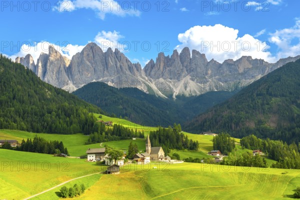 Scenic summer landscape with the famous chiesa di santa maddalena and the odle peaks in funes