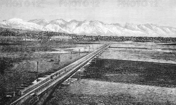 The city of Zion, city of the Mormons, on the Great Salt Lake with the snow-covered mountain