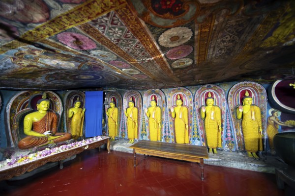 Buddha figures in the Aluvihara Rock Cave Temple or Cave Monastery, Aluvihara, Matale, Central