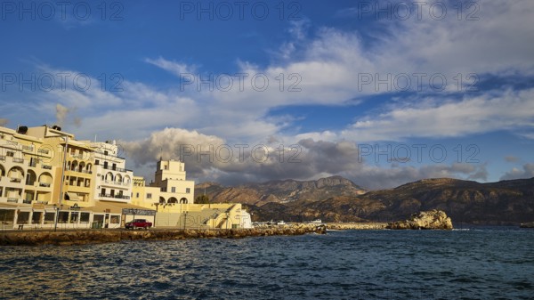 Morning light, A beautiful coastal town with harbour and mountains in the background, Pigadia, town