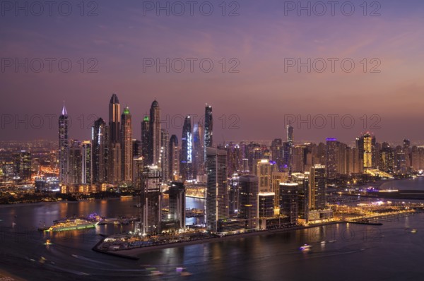 Night shot, view from The View At the Palm viewing platform of skyline with Princess Tower, Elite