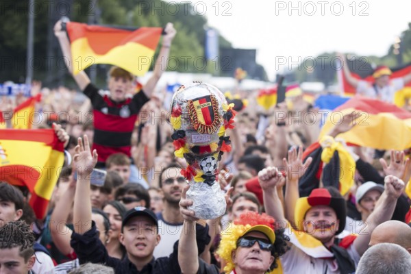 A homemade trophy in the fan zone at the Brandenburg Tor during the quarter-final match between