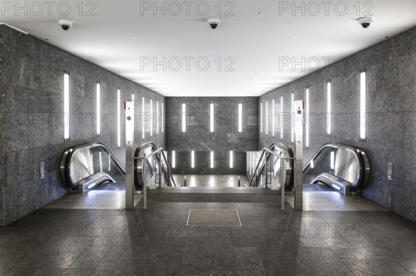 Tunnel subway illuminated with LED light with escalators to the Museumsinsel underground station,