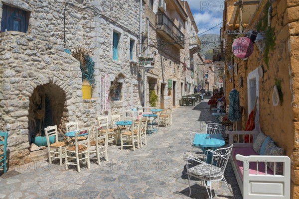 Dreamy alley with colourful houses and a cosy bistro area, Old Town, Areopoli, Areopolis, Tsimova,