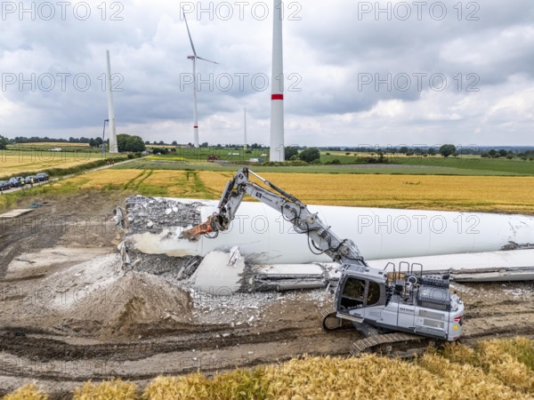Demolished tower of a 20 year old wind turbine, in the Werl wind farm, 5 old Enercon E-66 turbines