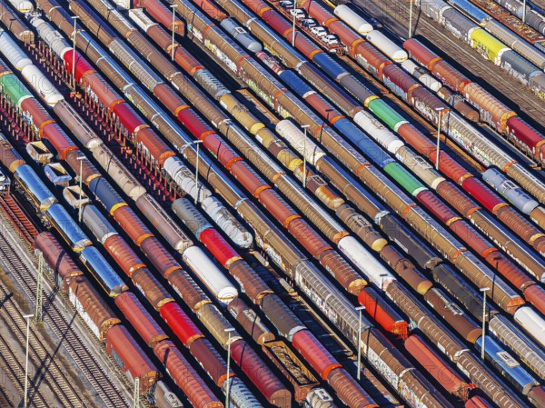 Deutsche Bahn AG marshalling yard. Many goods trains are parked on the tracks with tank wagons, car