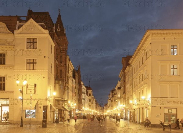 The medieval old town of Thorn illuminated in the evening. The historic city centre of Torun is a