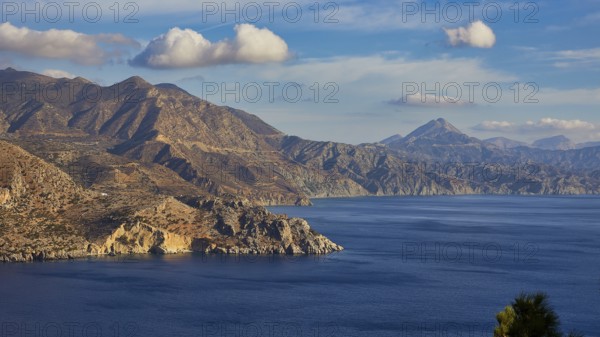 Panorama of mountains and sea in sunny weather, morning light, sunrise, coastal road, east coast,