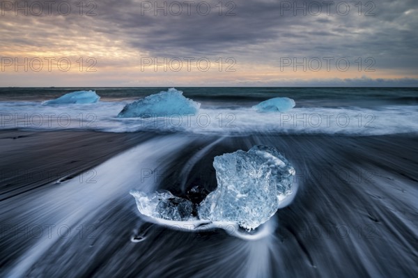 Diamond Beach, icebergs on the black lava beach, near Jökulsarlon glacier lagoon, Vatnajökull