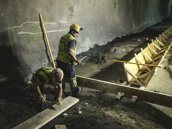 Workers in cross-passage 70, construction lot H53, Brenner Base Tunnel, Wolf, Tyrol, Austria,