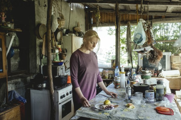 Olena in the house of the Cossack Oleksandr. She comes from Donetsk, her man is friends with