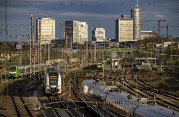 Train on the tracks west of Essen central station, city centre skyline, ICE and RRX, Rhine-Ruhr