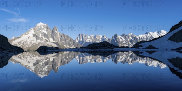 Mountain landscape in the evening light, water reflection in Lac Blanc, mountain peak, Aiguille
