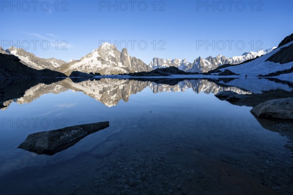 Mountain landscape in the evening light, water reflection in Lac Blanc, mountain peak, Aiguille