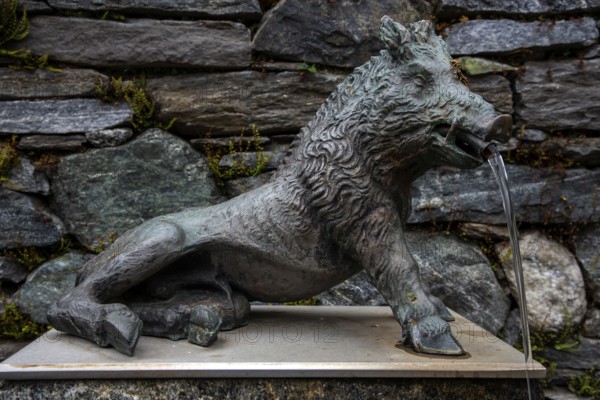 Fountain, wild boar fountain in the mountain village of Bordei, Centovalli, Canton Ticino,