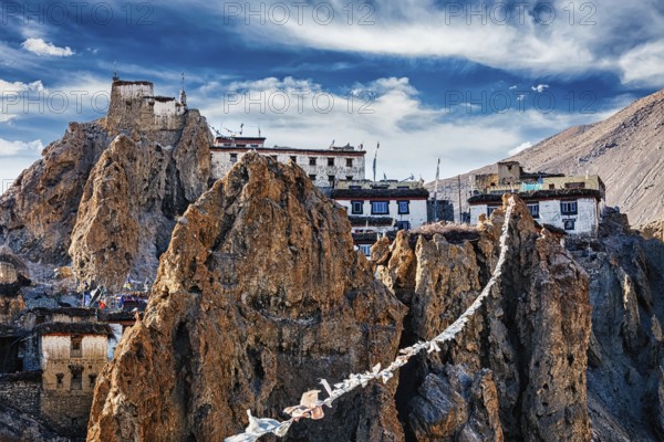 Dhankar gompa Tibetan Buddhist monastery and prayer flags lungta. Dhankar, Spiti valley, Himachal