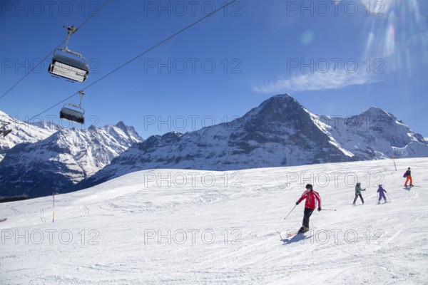 25 March 2024: Skiing against the backdrop of the north face of the Eiger in Grindelwald,