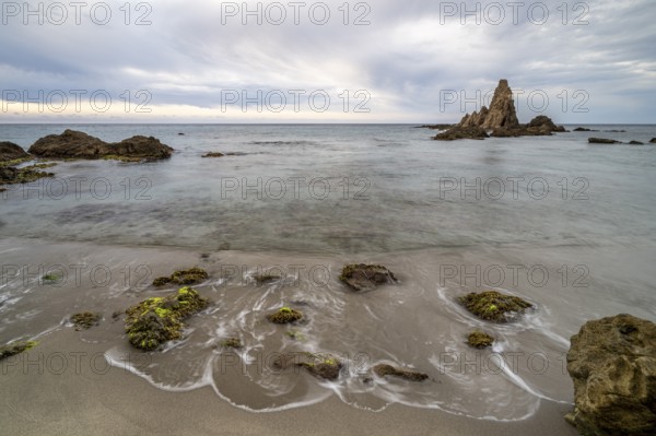 Rocky coast, rocks washed by water, Cabo de Gata-Nijar Natural Park, Almeria, Andalusia, Spain,