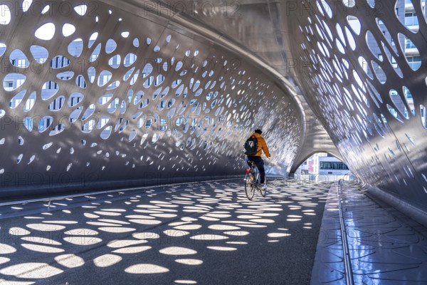 Light effects from the sun in the Parkbruk, a cycle and pedestrian bridge in the city centre of