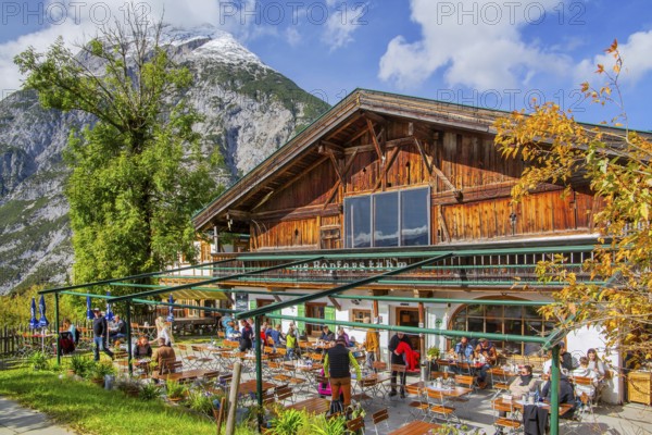 Landgasthof Ropferstubn with restaurant terrace overlooking the Inn Valley in front of the Hohe