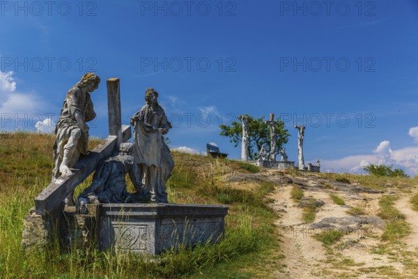 Crucifixion group close to the Windmill. Windmill Retz, located in Lower Austria. The windmill is