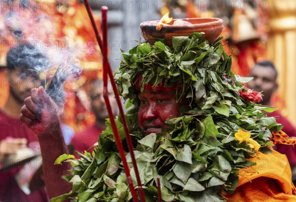 GUWAHATI, INDIA, AUGUST 19: Priest dance in the beat of Dhol (Drum) during the annual