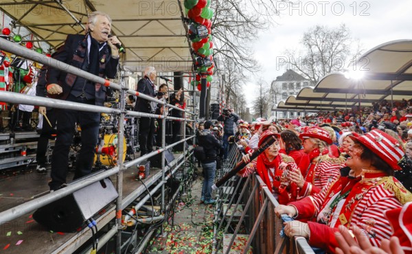 Colourfully costumed carnival revellers celebrate carnival in Cologne, on Weiberfastnacht the