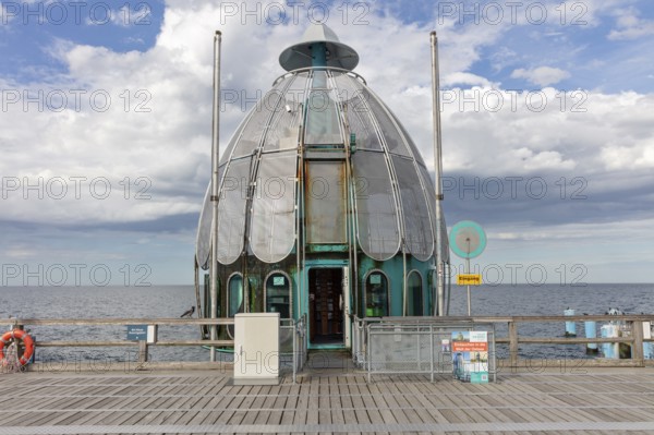 Metal pavilion at the end of a pier with sweeping sea views, Rügen