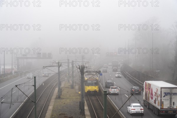 Dense fog, with visibility sometimes less than 100 metres, A40 motorway, city passage in Essen,
