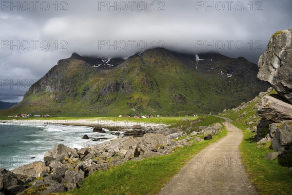 Uttakleiv (Utakleiv) with mountains, in the foreground the hiking trail around the mountain Veggen.