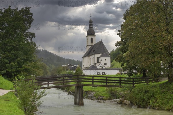 Parish church of St Sebastian, bridge, stream, rainy weather, Ramsauer Ache, Ramsau,