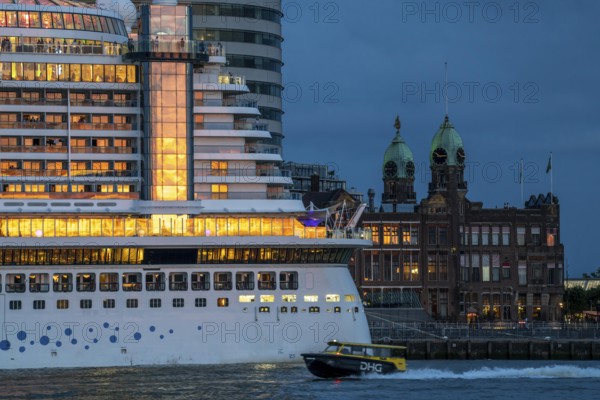 Cruise ship Aida Prima at the Cruise Terminal of Rotterdam, Kop van Zuid, skyscrapers at the