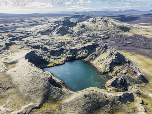 Lake in Tjarnargigur crater, moss-covered Laki crater or Lakagígar, series of craters, aerial view,