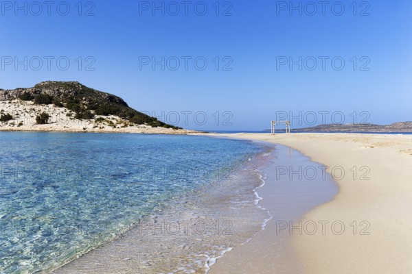 Crystal clear turquoise water, deserted dream beach in spring, Simos beach, Sarakiniko beach,