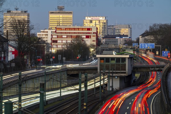 Motorway A40, Ruhr expressway, heavy traffic jam, rush hour, city passage in Essen, skyline of the