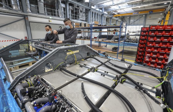 Herten, North Rhine-Westphalia, Germany, Cummins Hydrogenics fuel cell factory. Employees assemble
