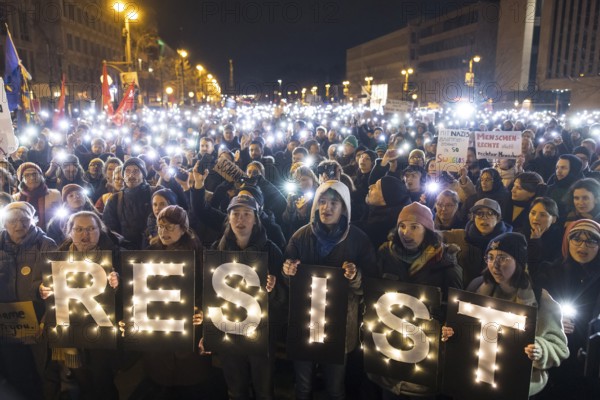 Sea of lights with Resist signs at the demonstration under the slogan Brandmauer statt Brandstifter