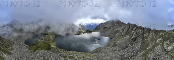 Mountain landscape with cloudy mountain peaks, mountain lakes Wangenitzsee and Kreuzsee, aerial