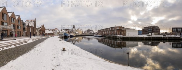 Panorama of the old town and harbour with water gate, St. Mary's Church and St. George's Church in