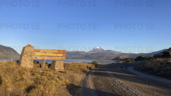 Dirt road to the entrance of Lanin National Park with the Lanin Volcano, Patagonia, Argentina,