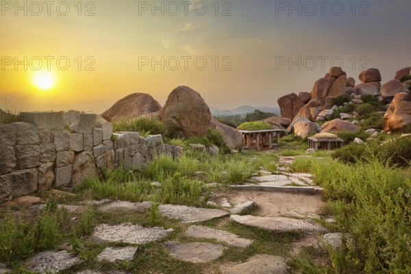 Ancient ruins in Hampi on sunset. Above Hampi Bazaar, Hampi, Karnataka, India, Asia