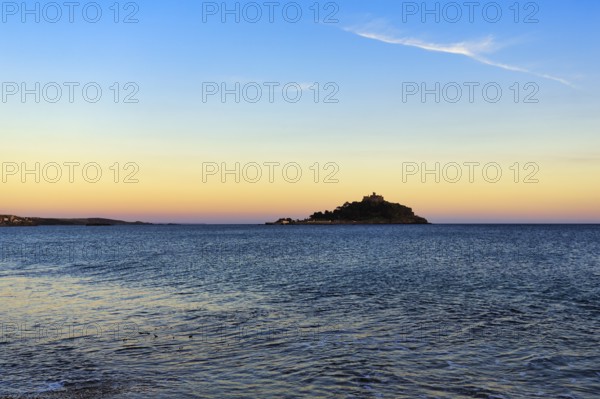 St Michael's Mount, tidal island with castle, evening sky, single cirrus, Marazion, Cornwall,
